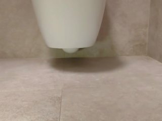 Sexy feet in the toilet